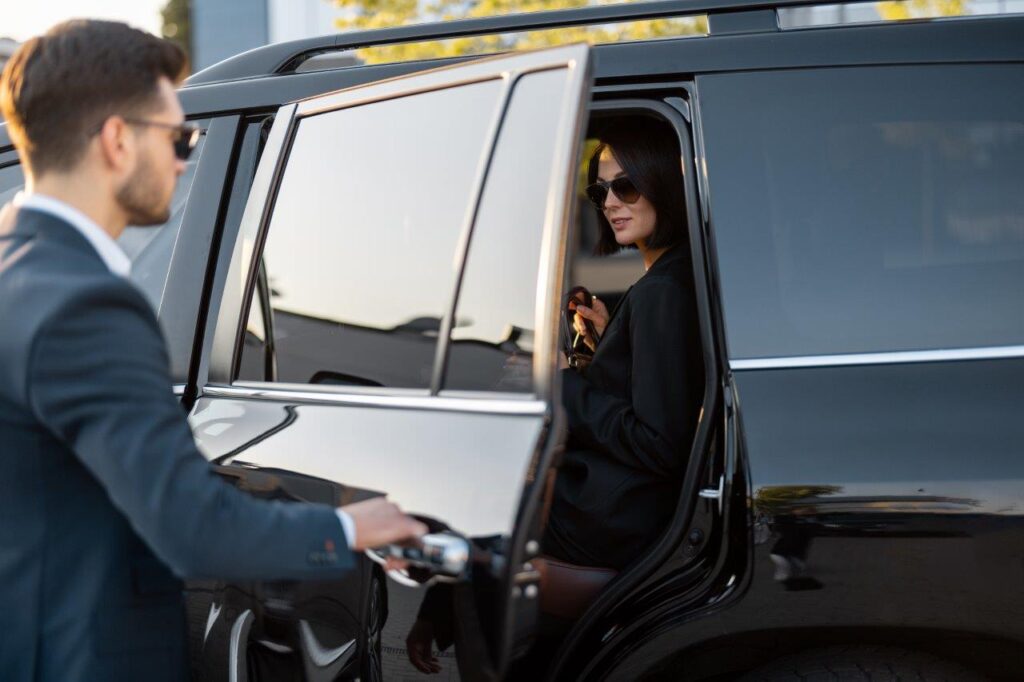 Business couple travel by car in Chicago